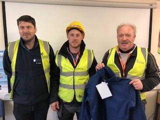 Ken Larkin receives Danone Contractor of the month safety jacket